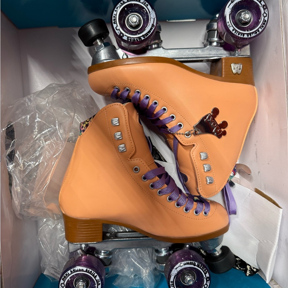 Vibrant Orange and Purple High-Top Roller Skates